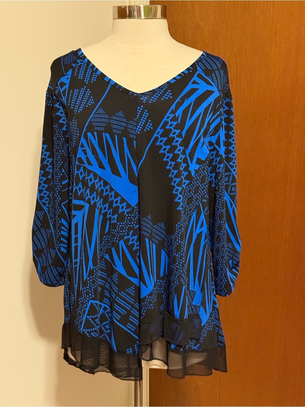 COLLECTIONS ETC. Blue Geometric V-Neck Women's Top